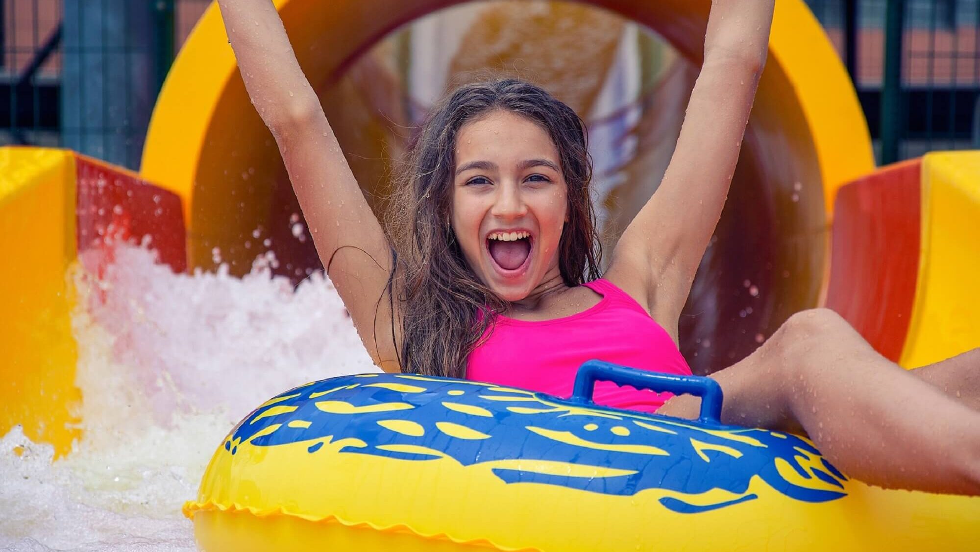 girl on a slide at a waterpark