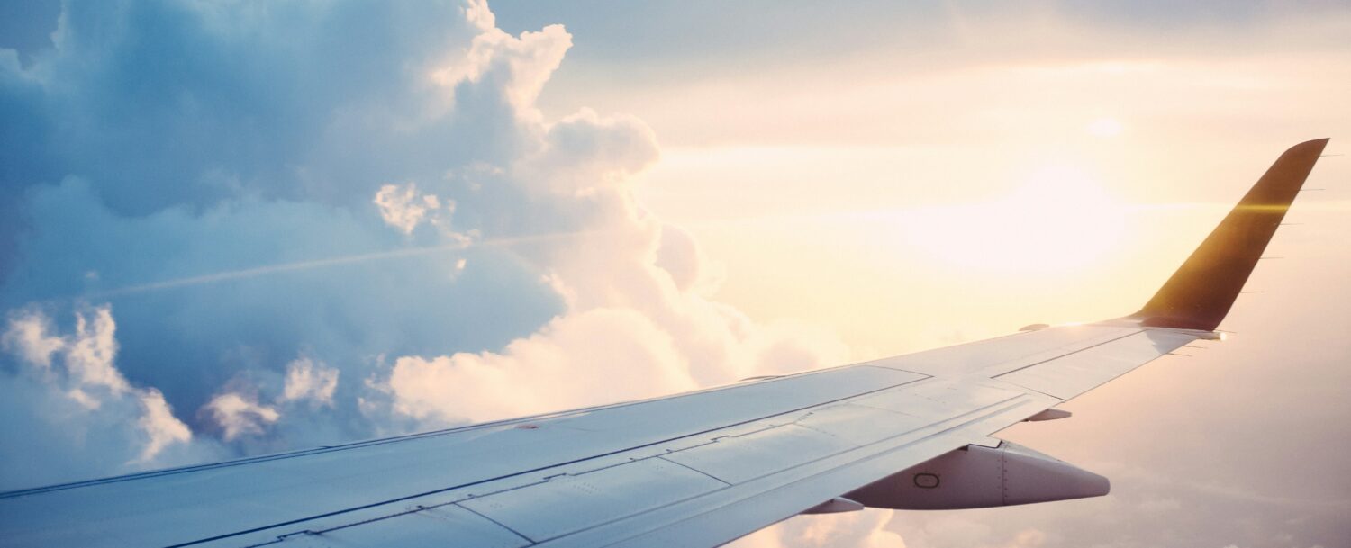 Airplane wing in sky from a direct flight to Biloxi Mississippi